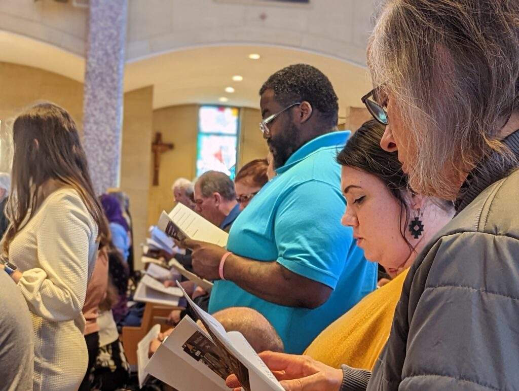 Cathechumens and Candidates participate in Mass at Rite of Election.