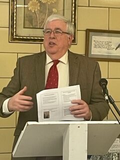 David Schmidt, director of pro-life, marriage and family life for the Diocese of Youngstown, explains the program Walking With Moms In Need program at the recent annual meeting of the Youngstown Diocese Council of Catholic Women.