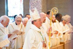 Bishop holds Crozier from past bishop