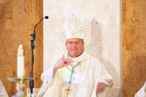 Bishop shows off the ring, that was once Bishop McFadden's