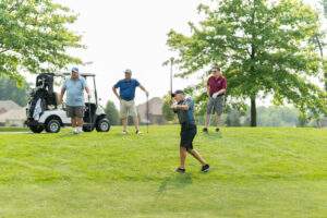 team watches member swing club
