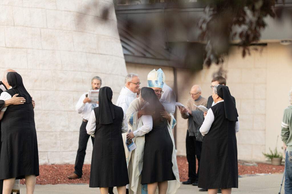 Bishop bonnar greets the religious sisters in attendance