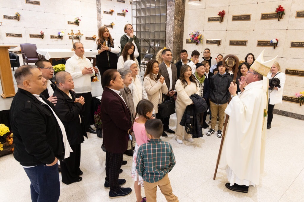 Bishop Bonnar blesses those gathered at St. Callistus Feast Day on October 14, 2024, at Calvary Cemetery in Massillon.