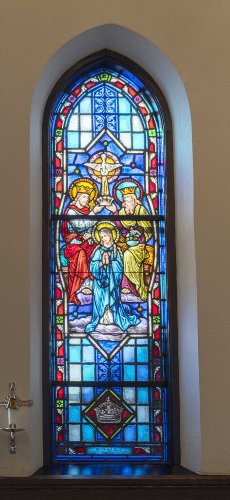 Stained glass window of Mary being crowned. Located at Immaculate Conception Parish in Ravenna. Photo by Brian Keith.