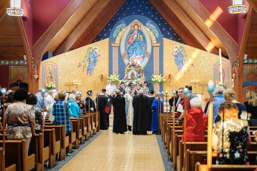 Parishioners carry an image of our lady of lebanon for the Assumption Pilgrimage in North Jackson. Photo by Brian Keith.