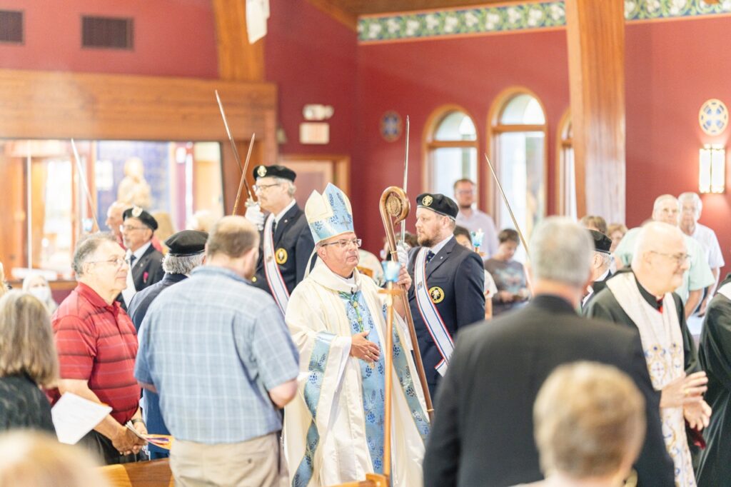Bishop Bonnar processes in for the Assumption Pilgrimage in North Jackson. Photo by Brian Keith.