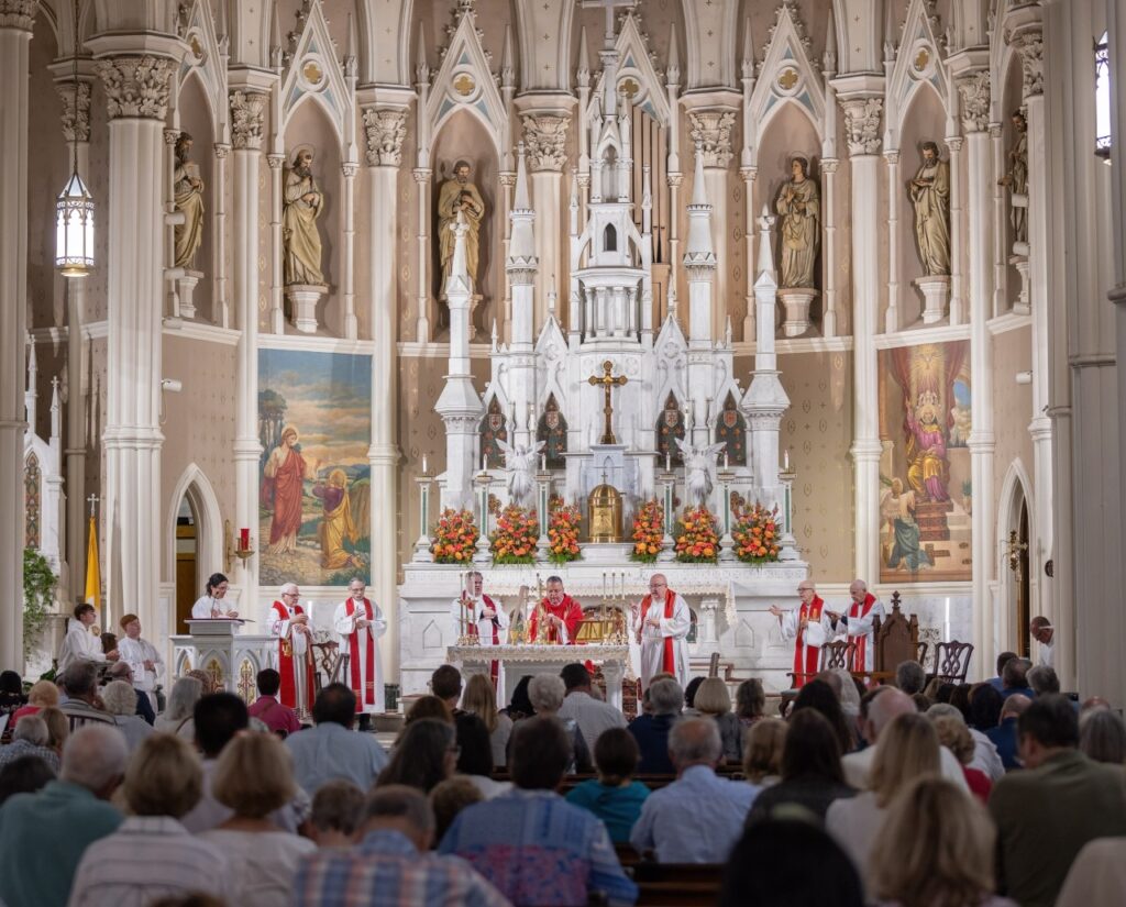 Wide shot of altar and congregation at the Rhoda Wise Anniversary Mass in St Peter Church, Canton, Ohio on June 28, 2024