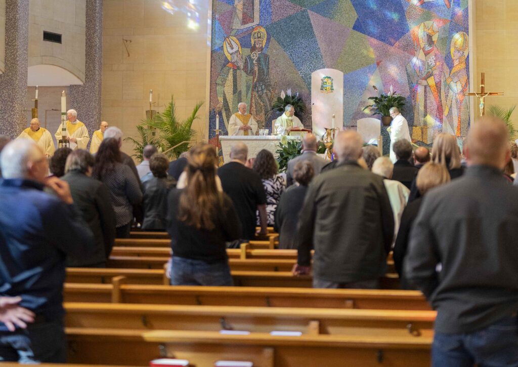 Image of full pews at St. Columba Cathedral during the Cursillo anniversary Mass