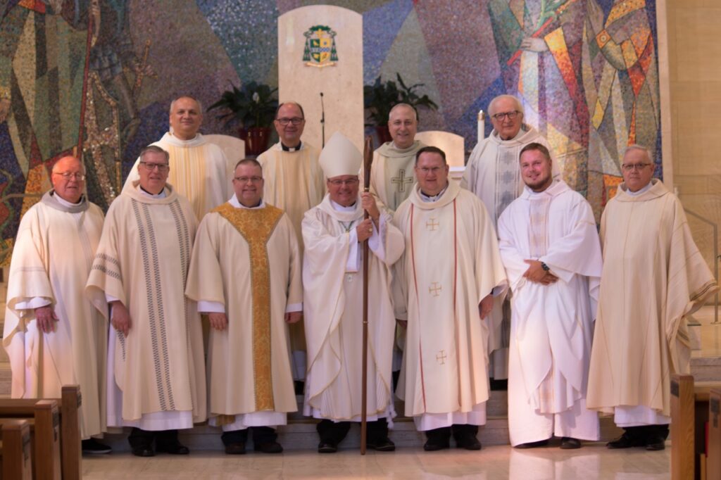 Group photo of Bishop Bonnar and Slovak Clergy. Photo by Courtney Poullas