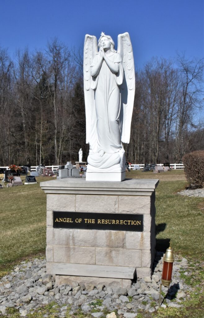 Image of an angel statue in a cemetery