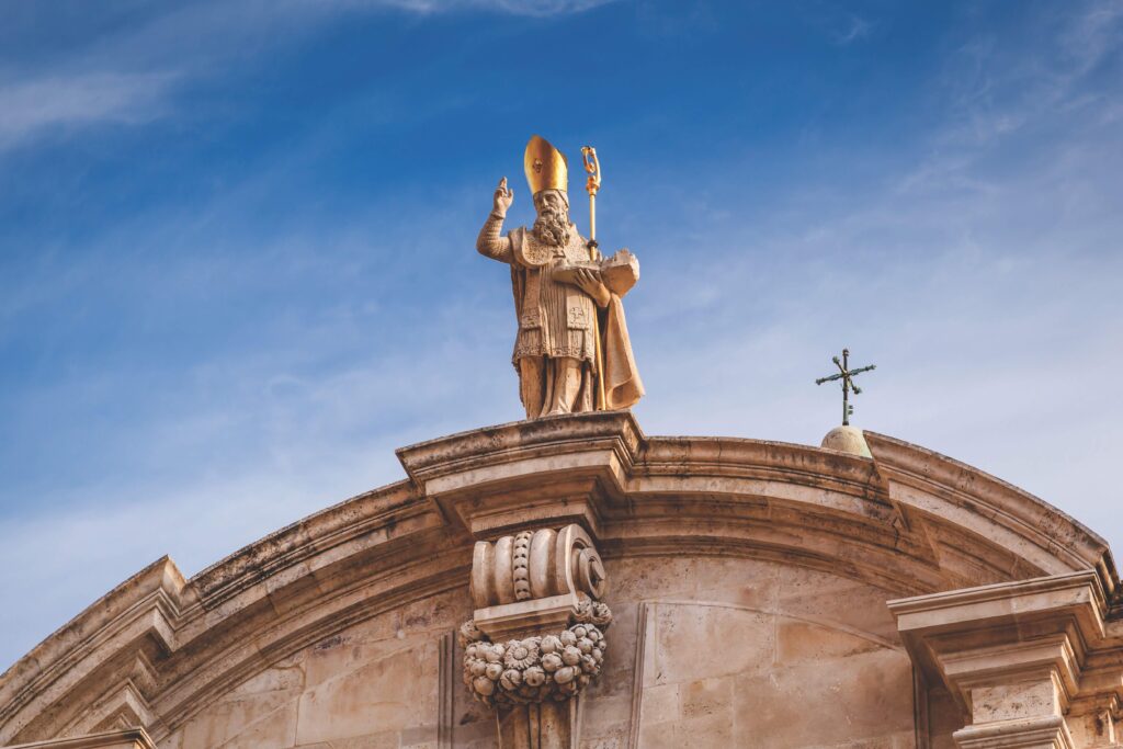Statue of St. Blaise on top of cathedral
