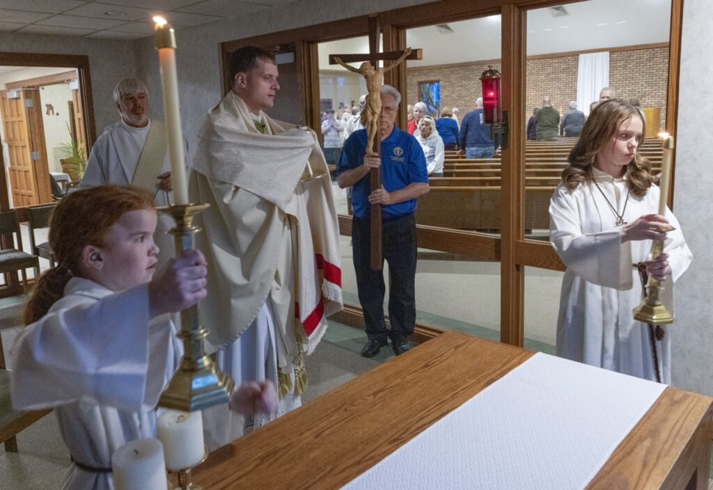 Father prepares to process at Holy Thursday Mass