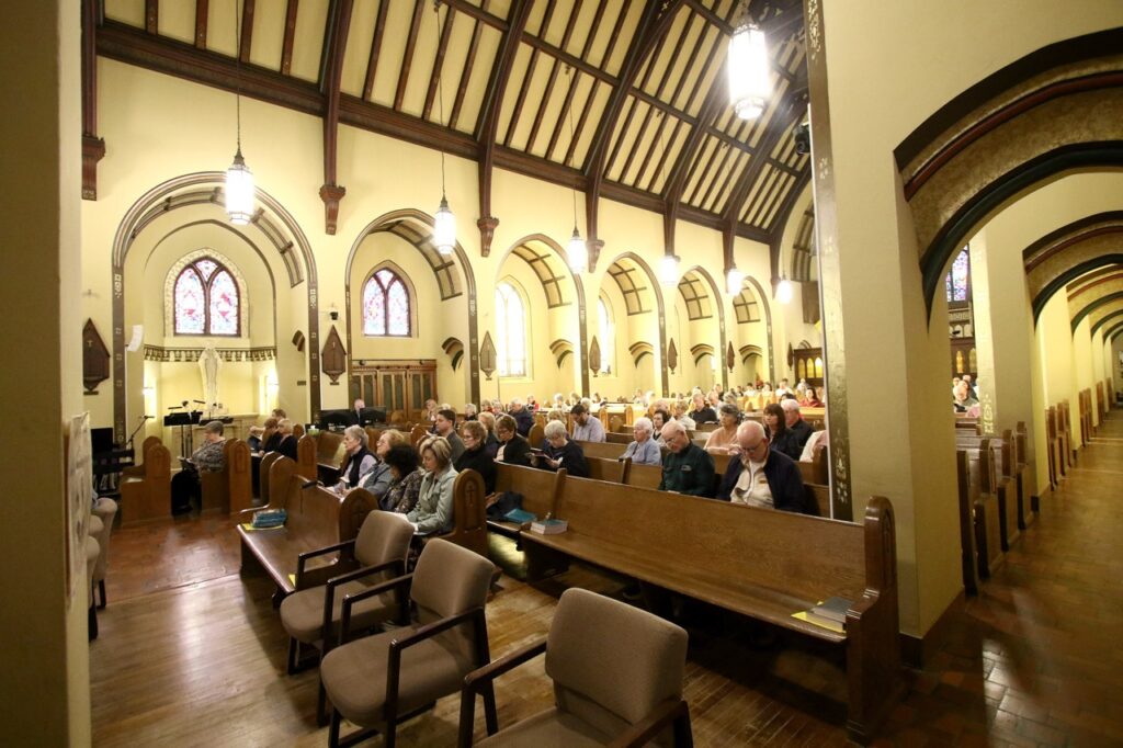 Parishioners attend mass at St. Paul Parish in Salem