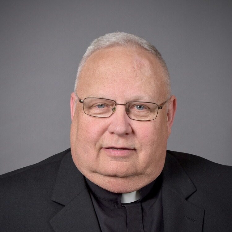 headshot of father brienz