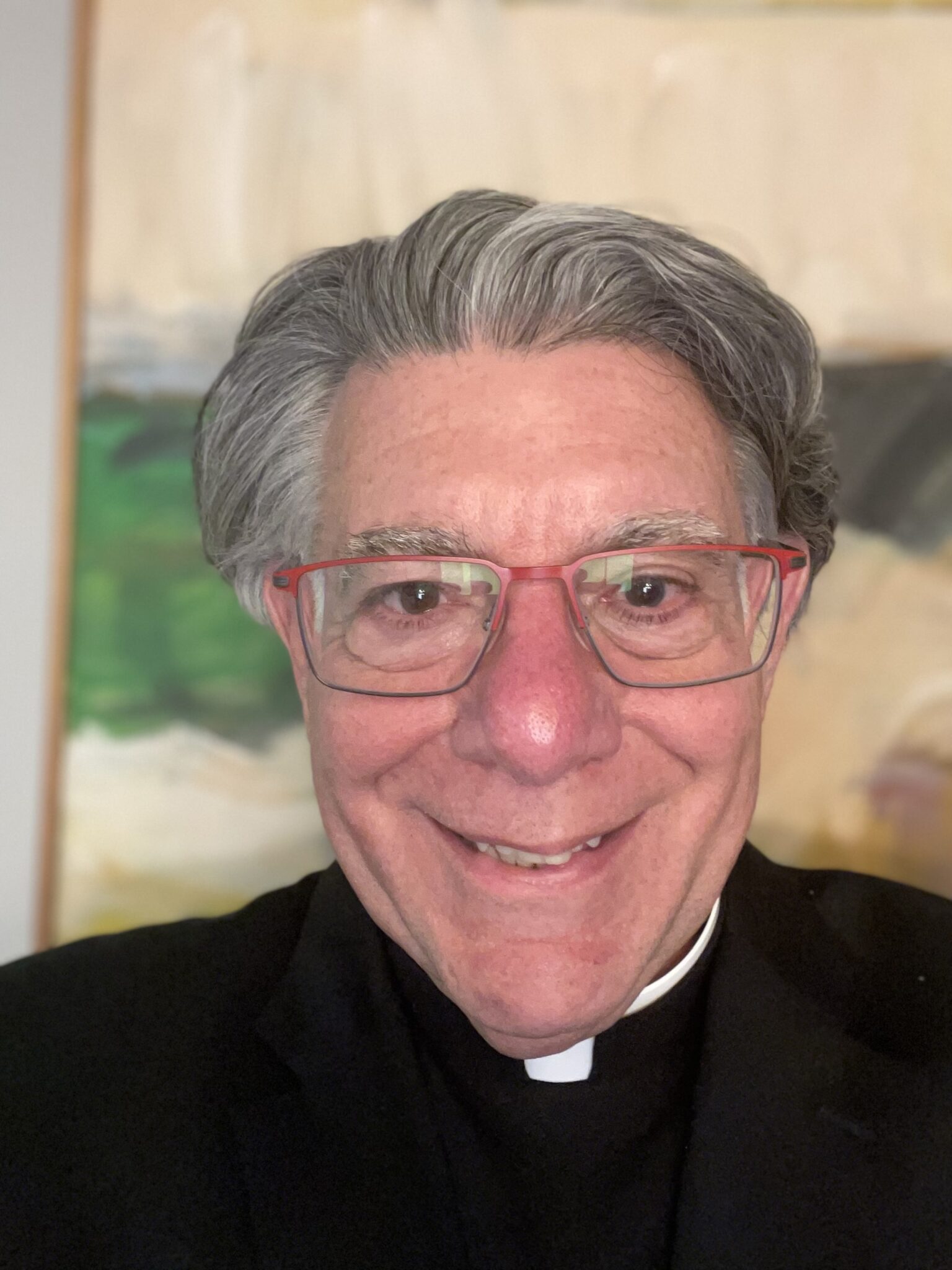 headshot of Father James Daprile