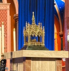 Golden reliquary holding the lower jawbone of Blessed Fulton Sheen, on stage at his Beatification Ceremony on September 24, 2026. Photo credit: Dominic Colucy