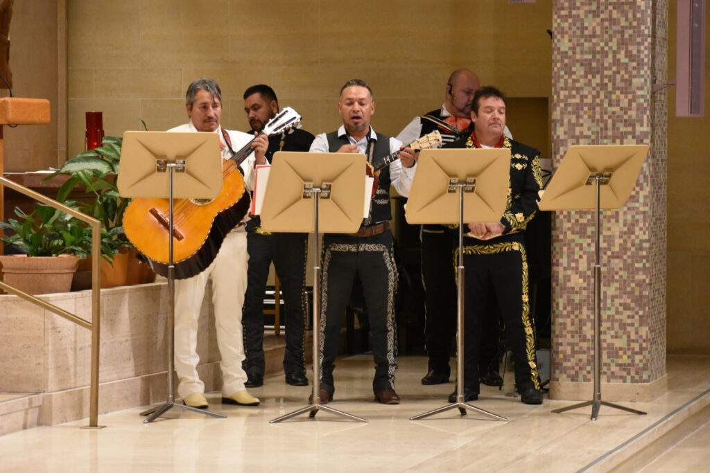 A mariachi band plays at the Our Lady of Guadalupe Mass.