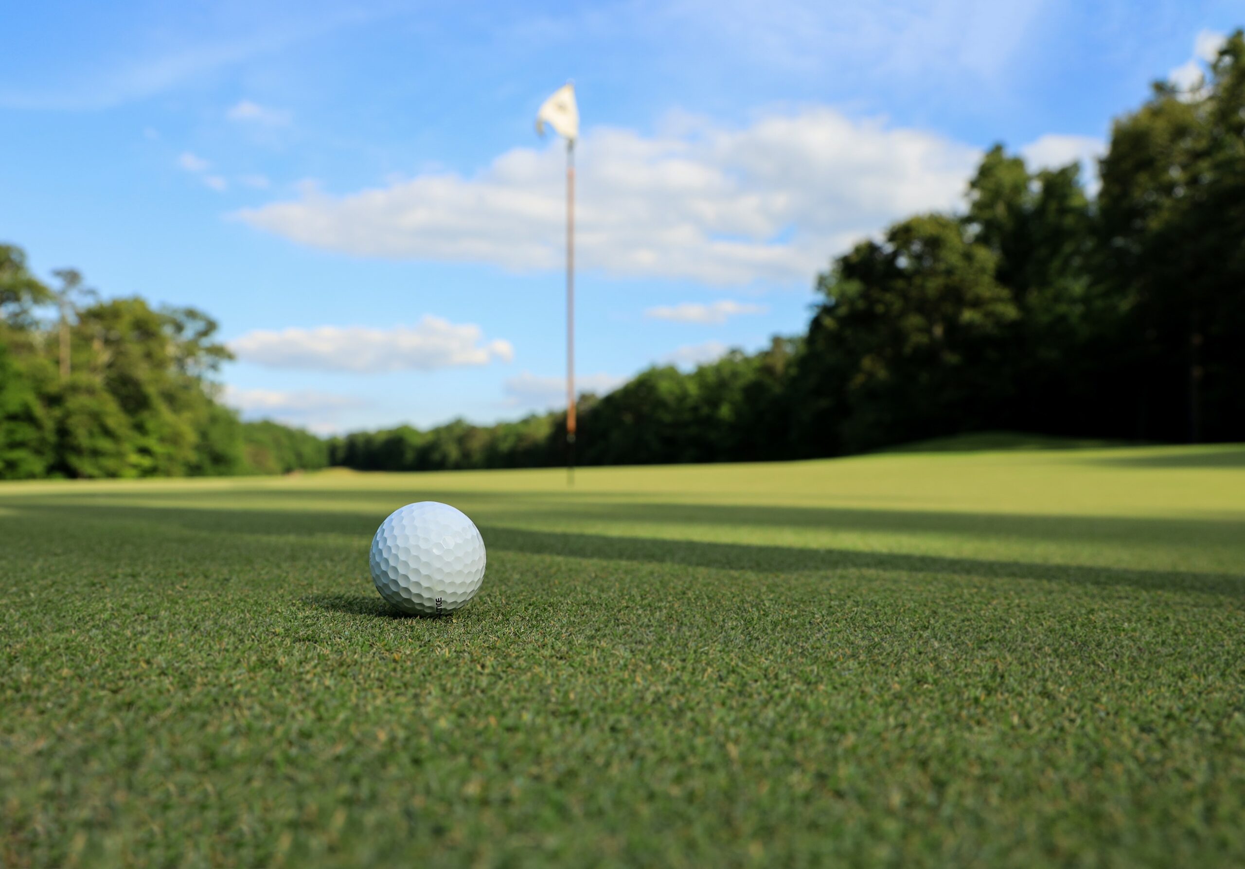Photo of golf ball on a green by mk._s, used under Unsplash license