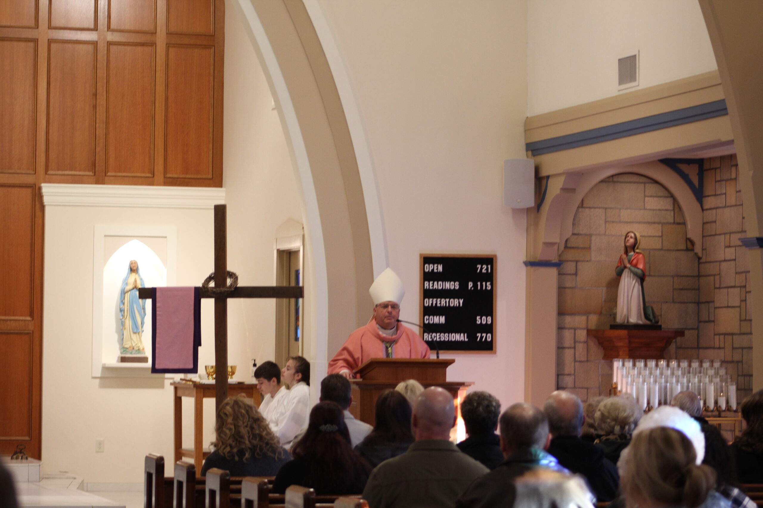 Bishop Bonnar, wearing rose for the fourth Sunday of lent, delivers his homily.