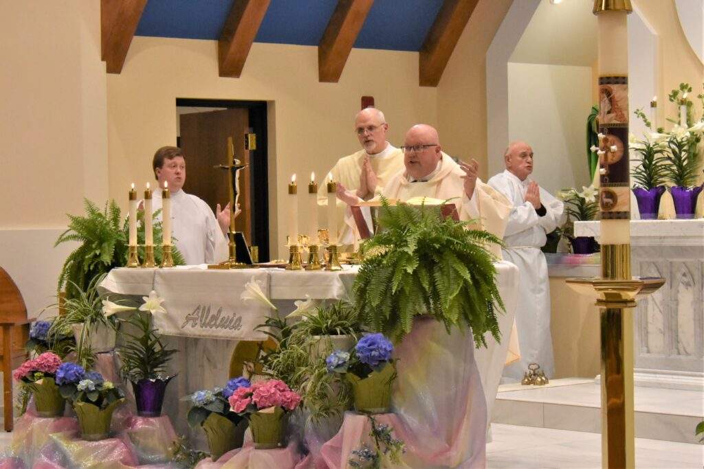 Fr. David Misbrener celebrates Mass in Columbiana