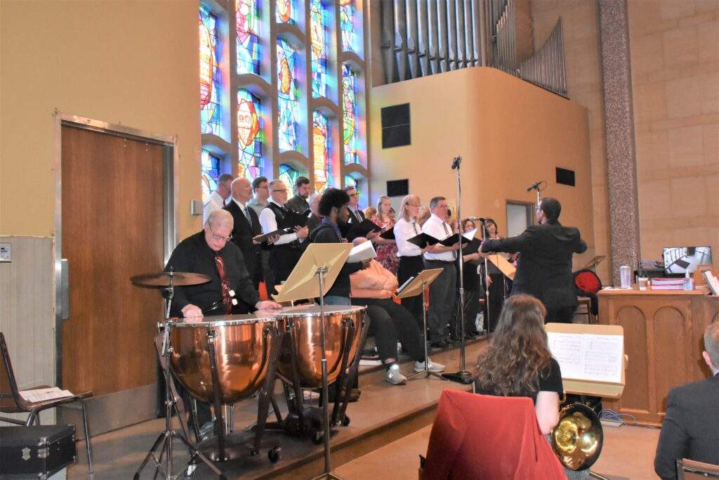 Choir and instrumentalists perform at the Chrism Mass