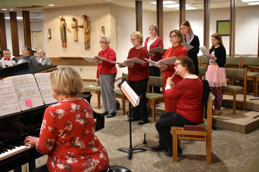 Choir wears red for Good Friday at St. William Parish