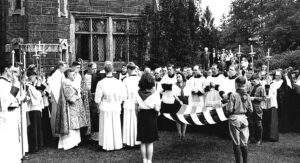 A large crowd stands in front of the new convent in this black and white photo