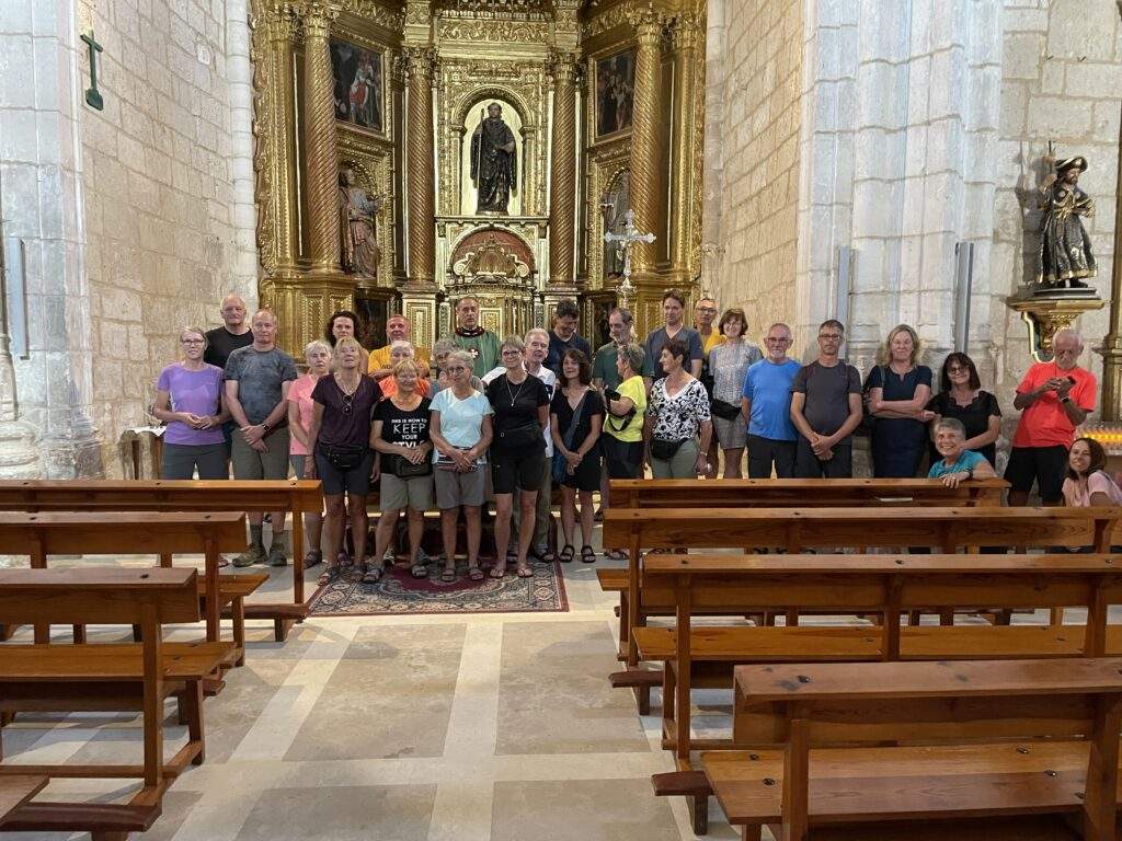 The Bonds pose with fellow pilgrims at the Cathedral of Santiago.