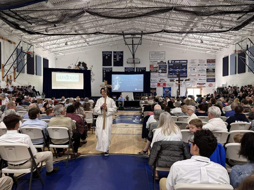 A large crowd in attendance at Saint John School's grandparents day Mass, in their gymnasium.