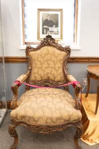 gold, ornate chair belonging to past bishop