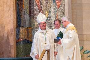 Bishop smiles as Mass concludes