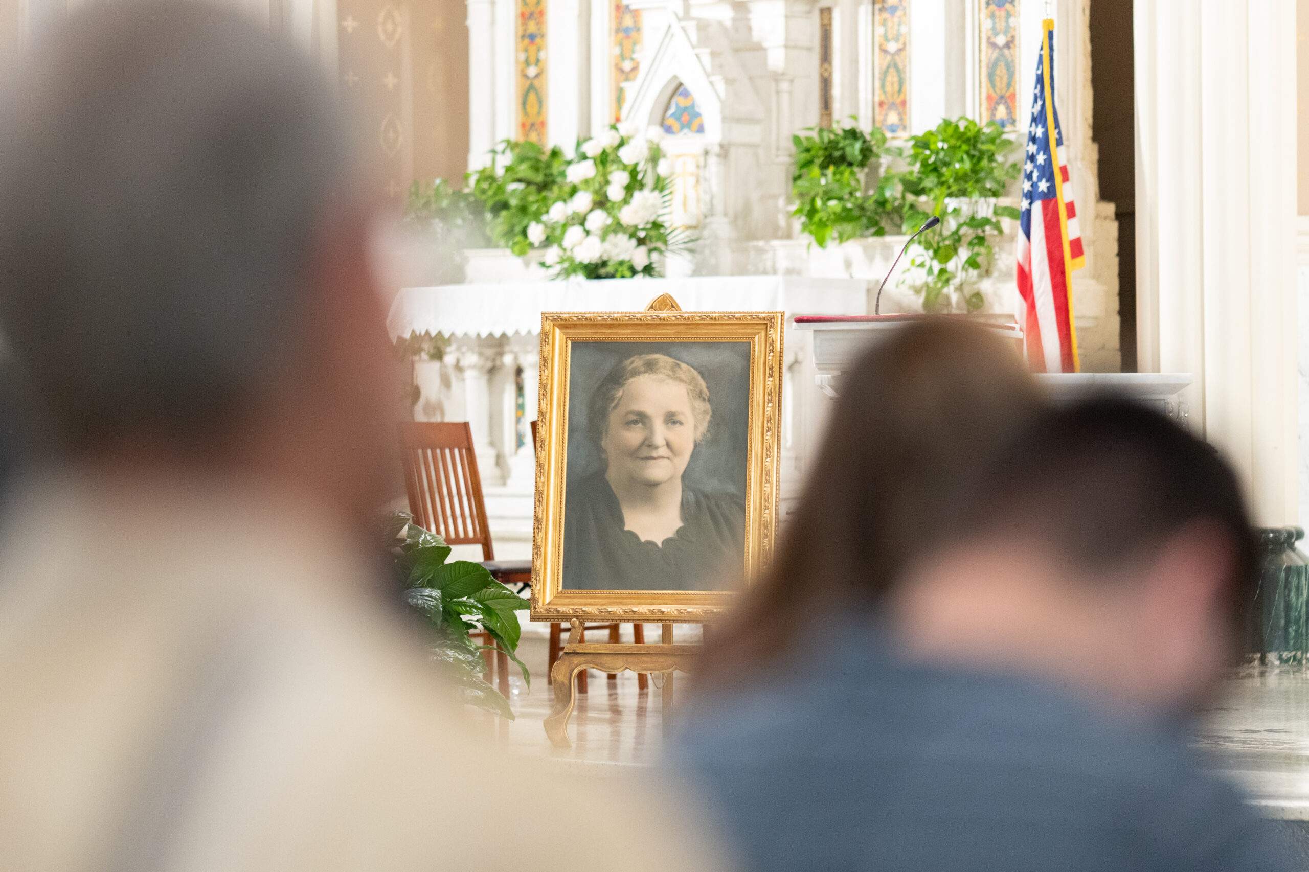 Image of Rhoda Wise displayed on the altar