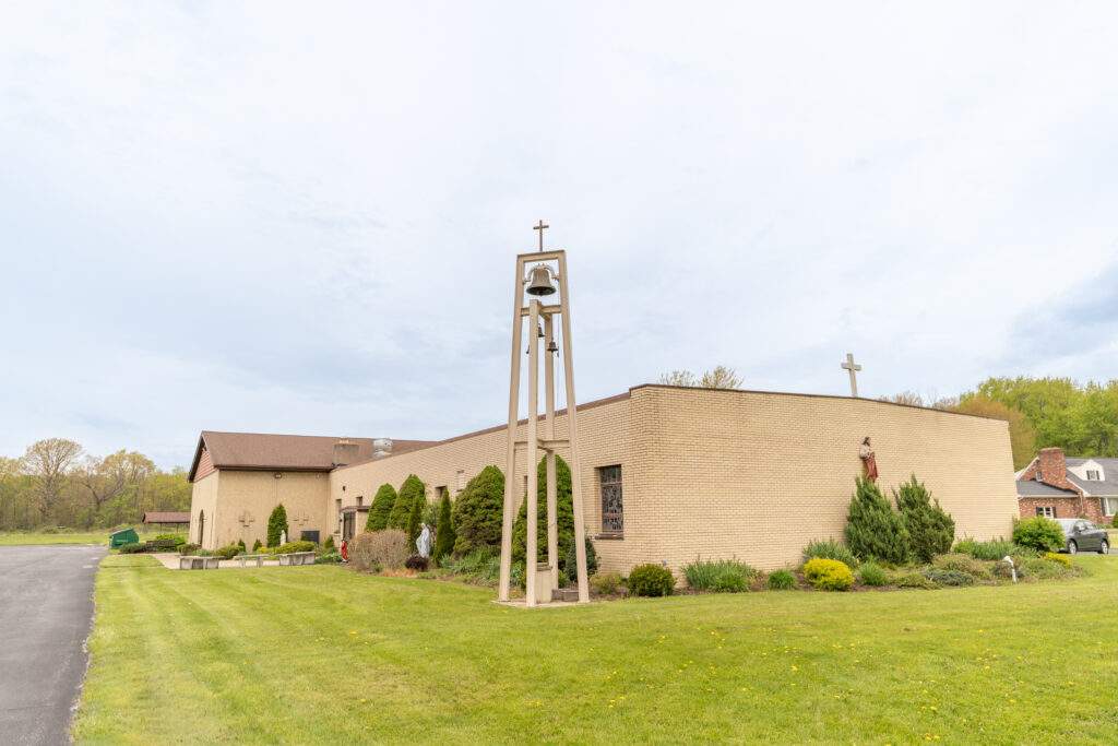 Outside of Sacred Heart Parish in Rock Creek. Photo by Brian Keith