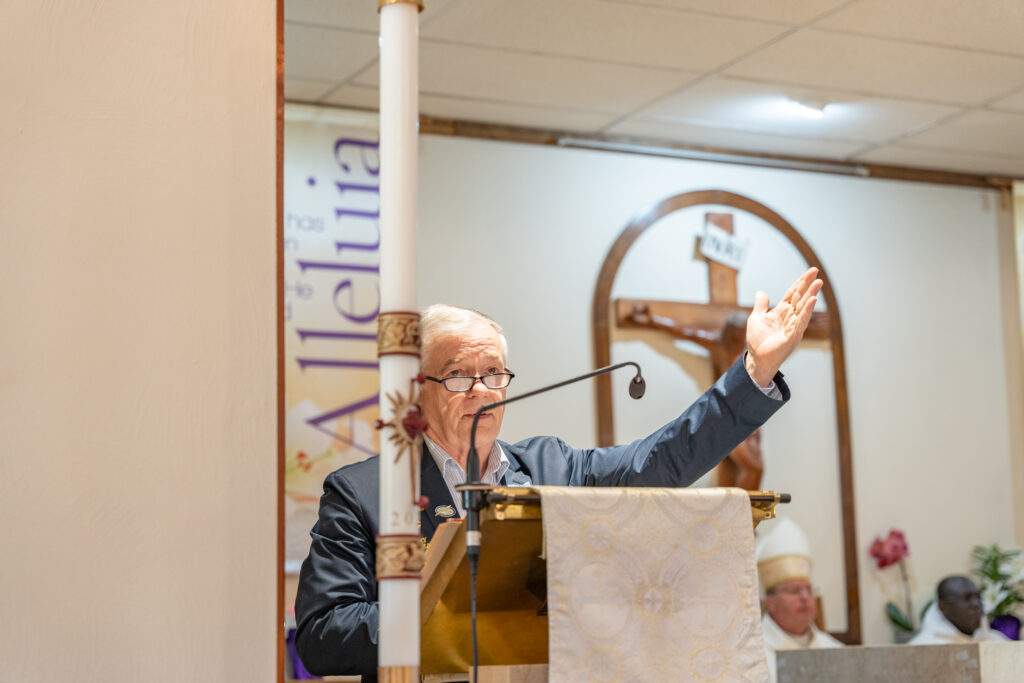 Cantor intones the psalm at Sacred Heart Parish in Rock Creek. Photo by Brian Keith