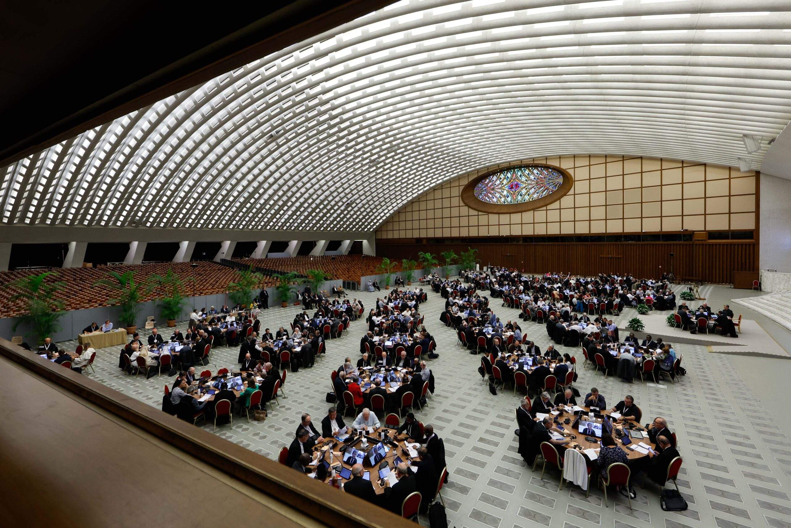 Members of the assembly of the Synod of Bishops start a working session in the Vatican's Paul VI Audience Hall Oct. 18, 2023. (CNS photo/Lola Gomez)