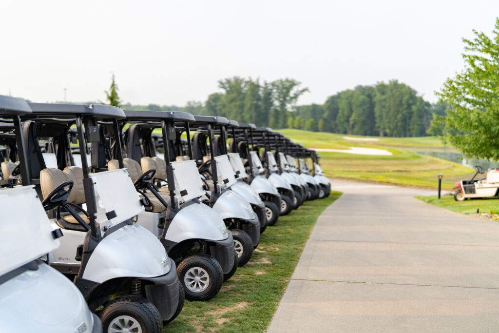Golf carts lined up for the tournament