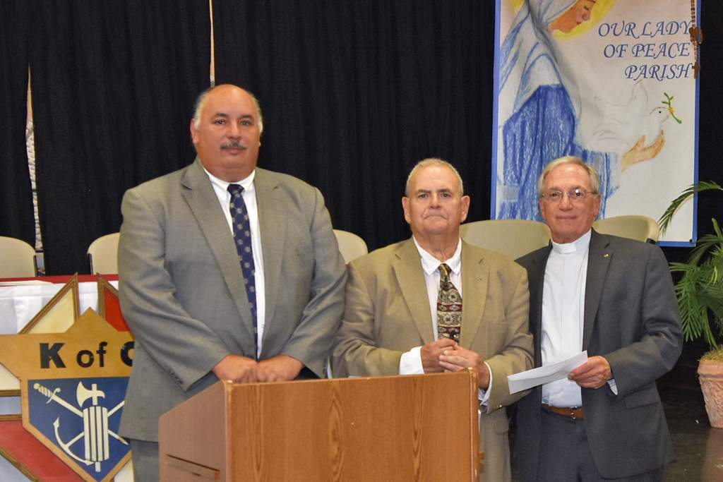 Father Thomas is recognized at the Knights of Columbus Ashtabula merger ceremony