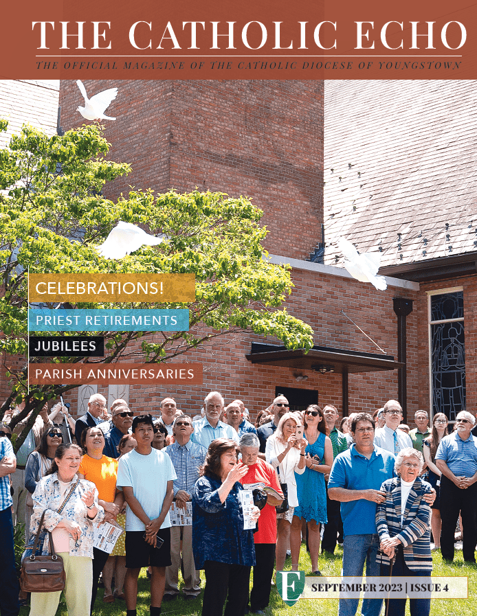The cover of the September 2023 magazine, featuring a dove release at St. Patrick Parish in Kent