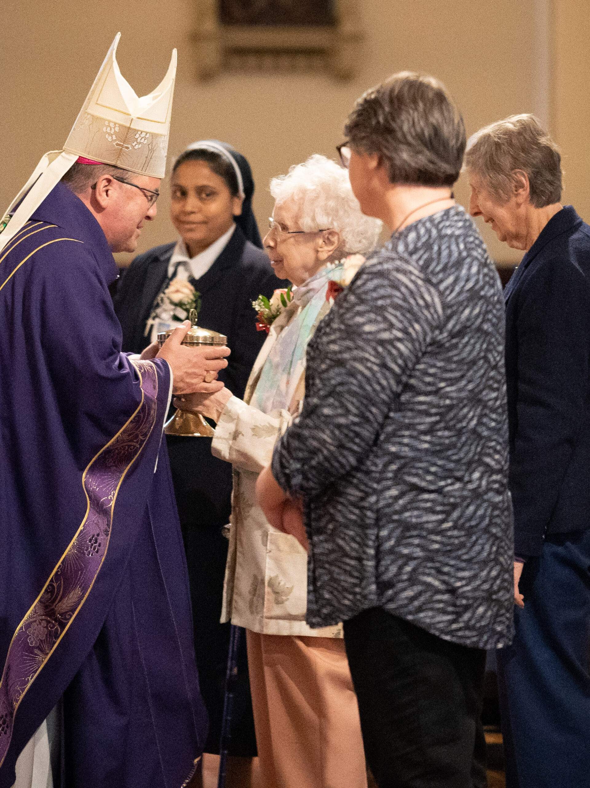 Sister Margaret Mary Siegfried, who celebrated her 80th jubilee this year, presented the gifts at the Jubilarian Mass.