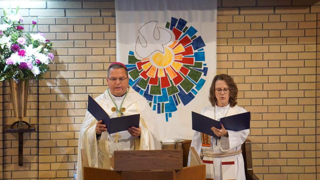 Bishop Bonnar and Bishop Laura Barbins hold a prayer service honoring the Lutheran-Catholic Covenant.
