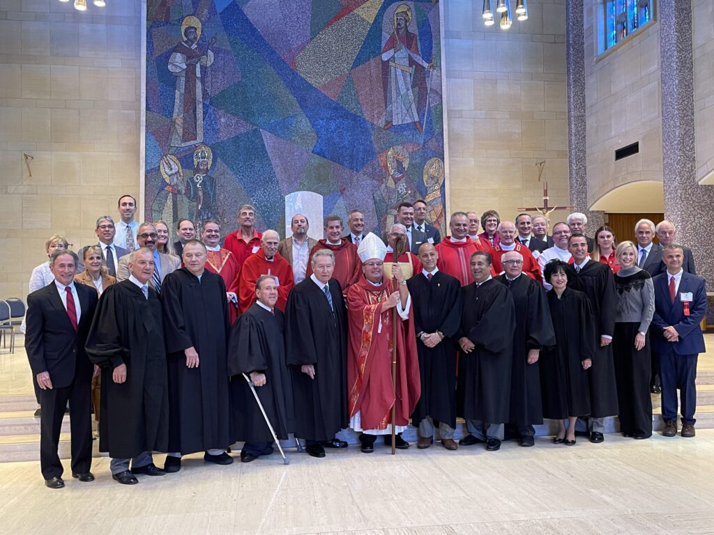 Group shot of lawyers and judges with bishop bonnar at the Red Mass, 2023.