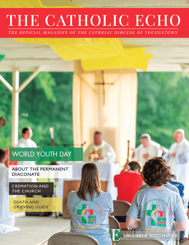 Cover of November 2023 Catholic Echo, featuring kids at local World Youth Day celebration.