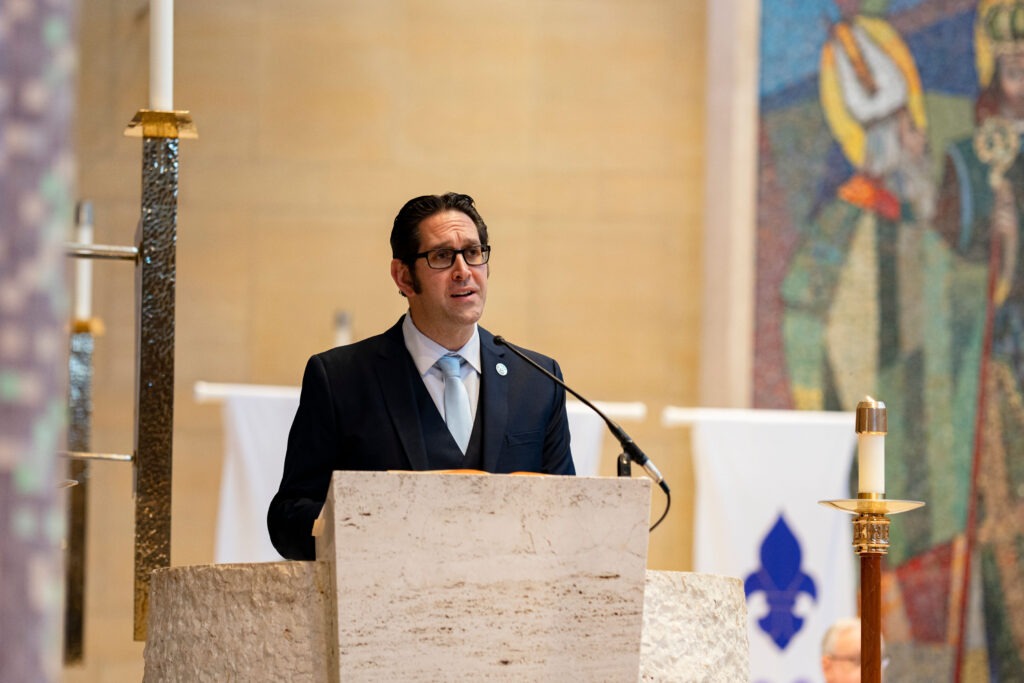 Mr. Chavez does a reading at the annual White Mass. Photo by Brian Keith.