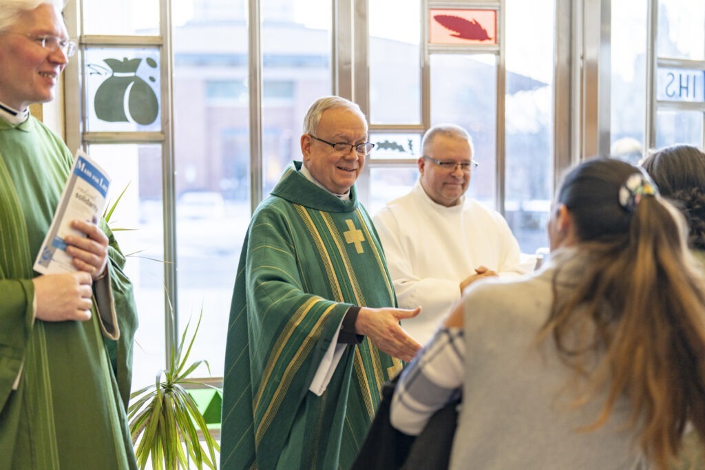 Monsignor Siffrin greets parishioners after the annual Diocesan Mass for Life on January 14, 2024, at St. Columba Cathedral.