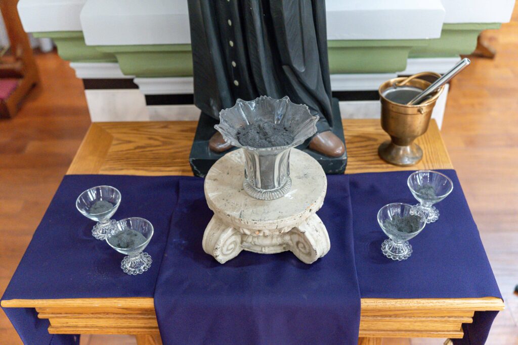 Ashes laid out on a table before Ash Wednesday Mass at Holy Trinity Parish in East Liverpool