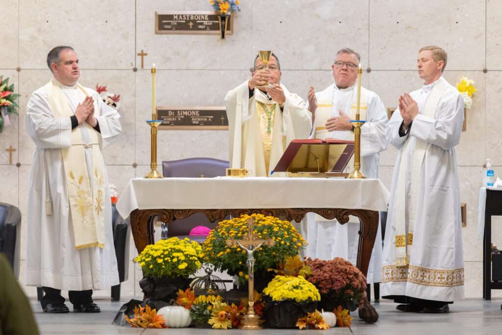 Bishop Bonnar prays the Eucharistic Prayers at St. Callistus Feast Day on October 14, 2024, at Calvary Cemetery in Massillon.