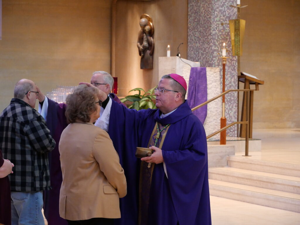 Bishop Bonnar administers ashes on ash Wednesday at St. Columba Cathedral