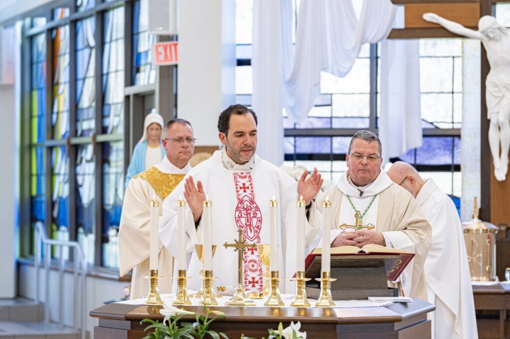 Father Cicero welcomes jubilarians to the Mass. Photo by Brian keith. 