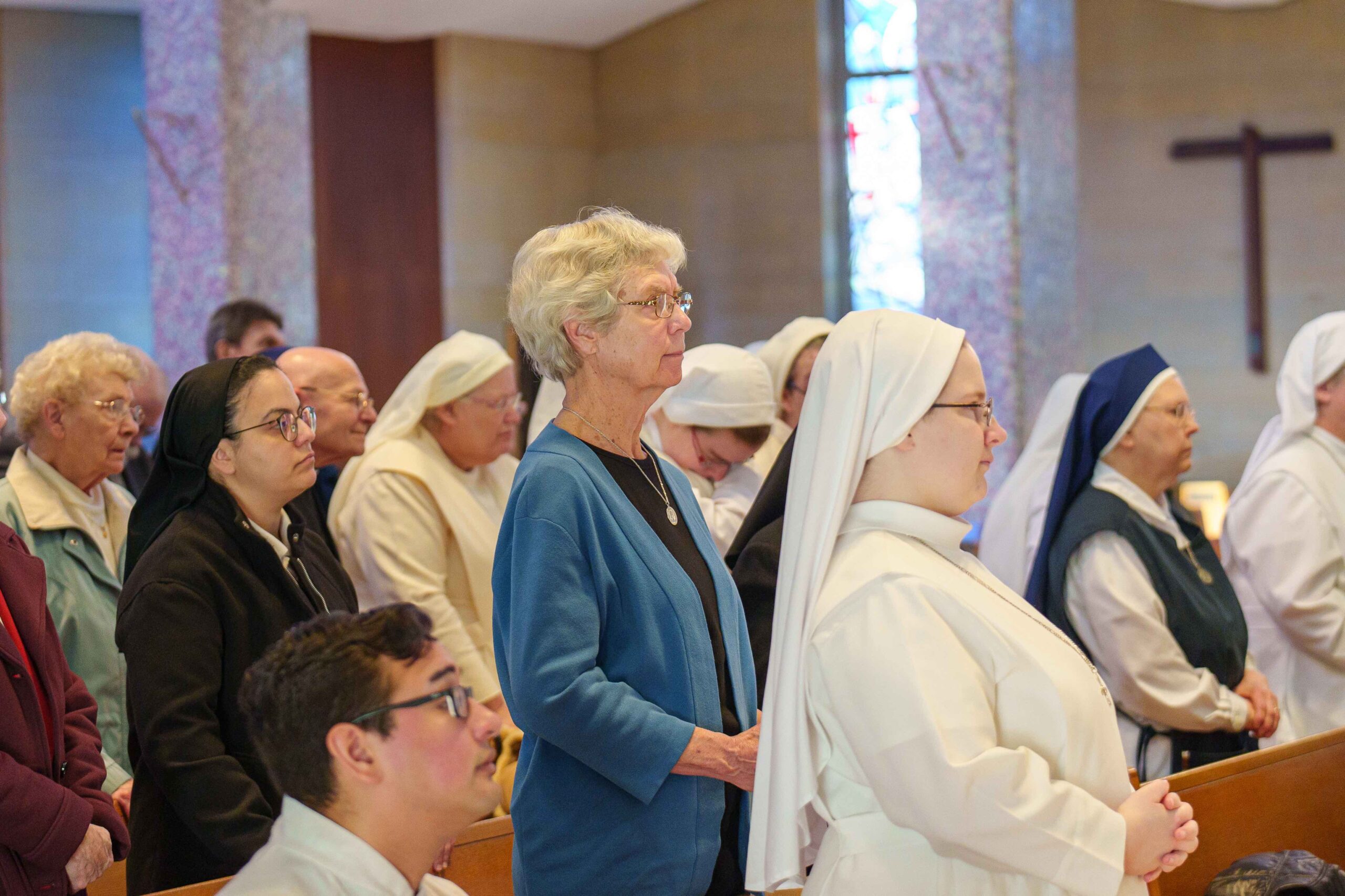 Religious sisters from various orders stand at the Mass for Consecrated Life in 2023. Photo by Jimmy Joe Savage