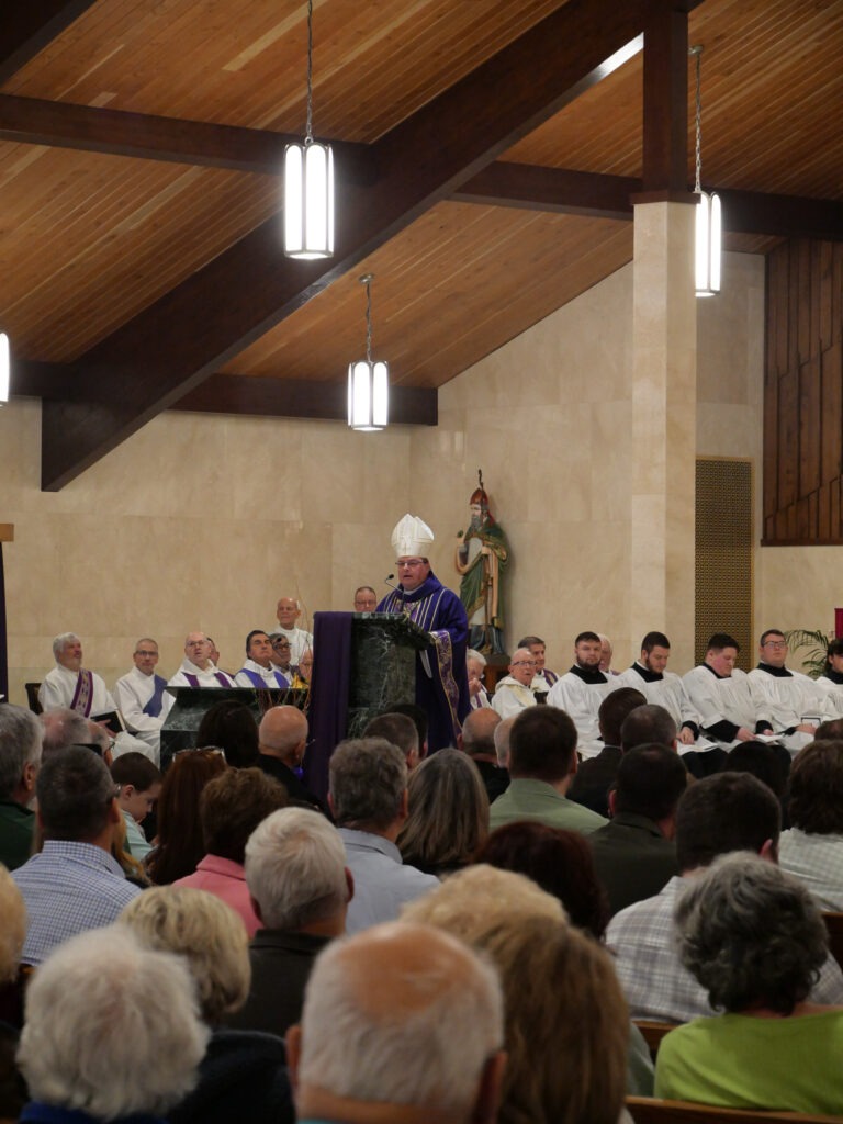 Bishop David Bonnar delivers the homily at Mass of Blessing for the re-opening of St. Patrick Parish in Hubbard, Ohio on March 17, 2024. Photo by Michael Houy.